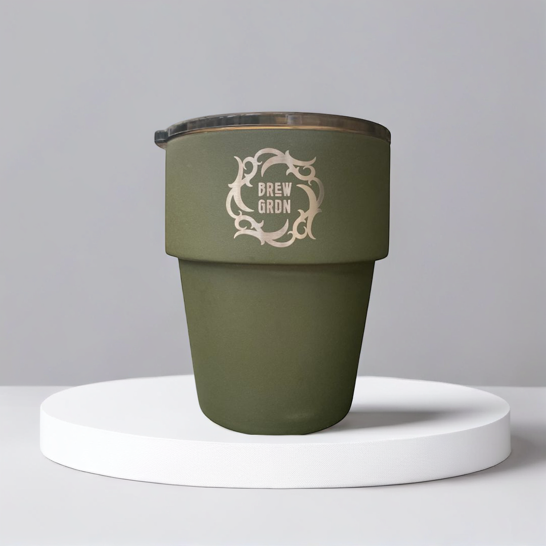 green reusable coffee cup