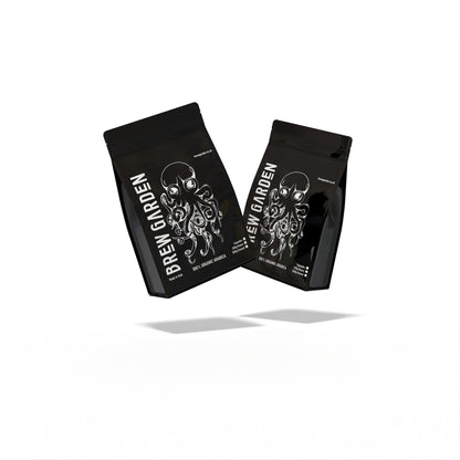 Two black coffee bags with 'Brew Garden' branding on a white background