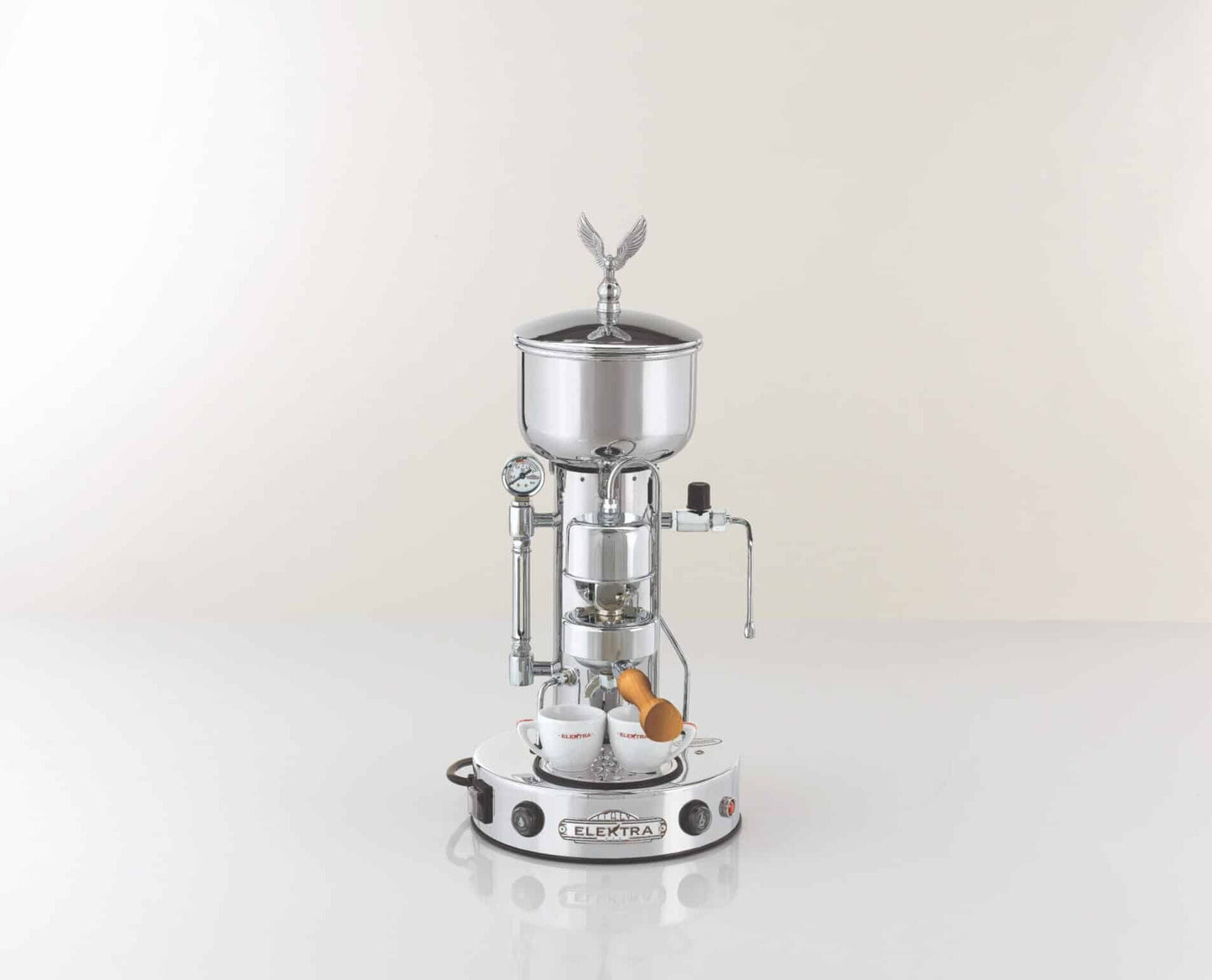 Silver espresso machine on a white background