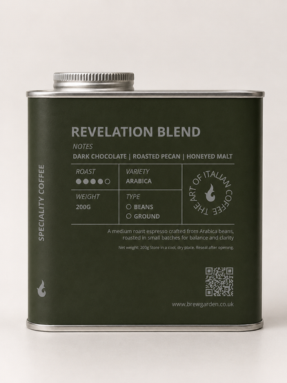 A matte dark olive green metal tin of Revelation Blend specialty coffee by Bruges Coffee, featuring white text and a silver screw-top lid, set against a plain light gray background.