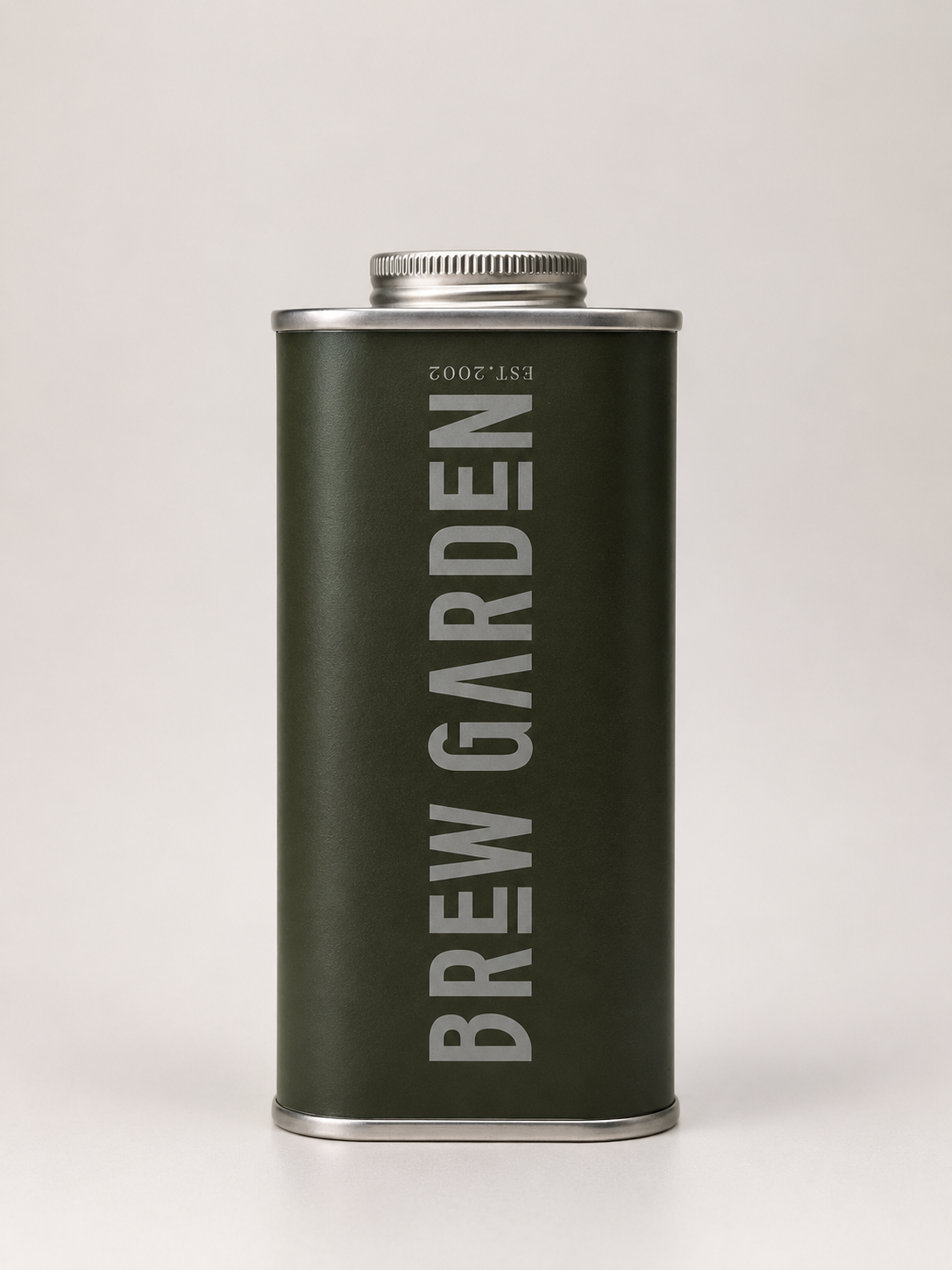 A dark olive green metal canister with a silver screw cap, featuring the brand name 'BREW GARDEN' printed vertically in light gray on the front, set against a plain light gray background.
